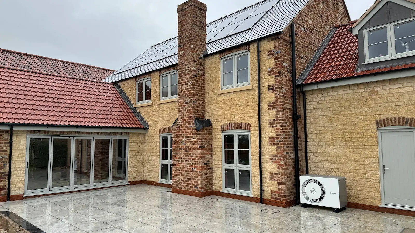 Bosch air source heat pump installed outside a home