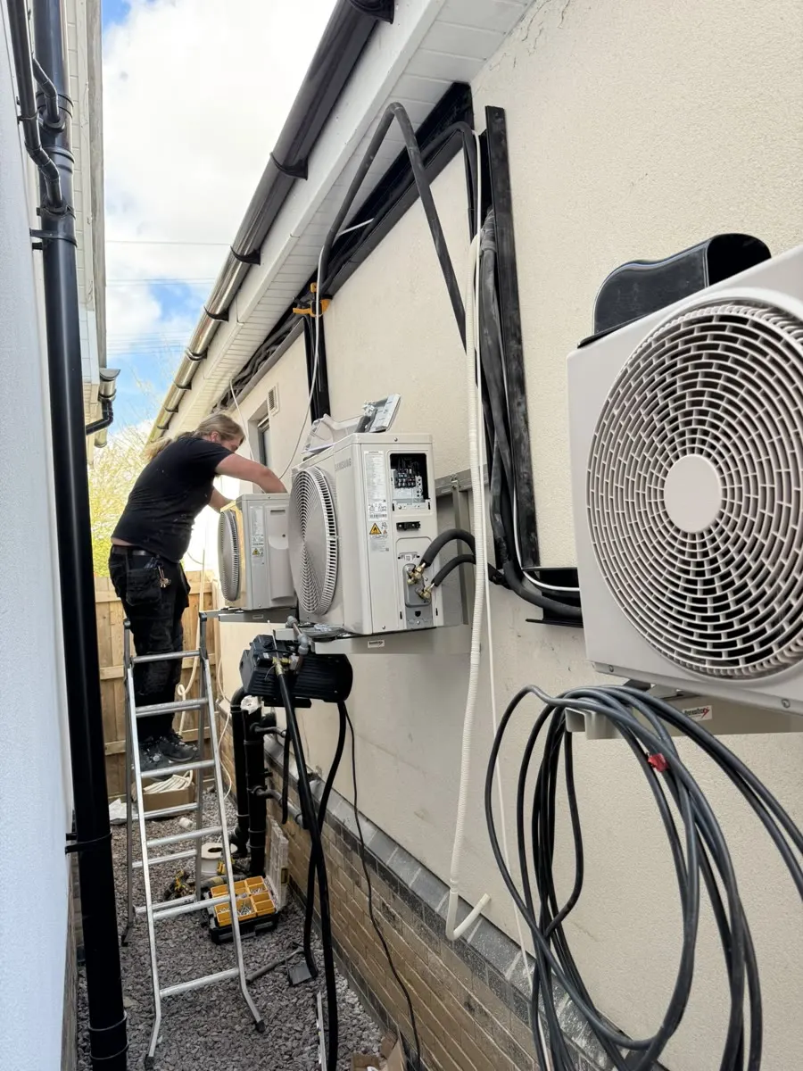 Vector Heat engineer installing Samsung air conditioning outdoor units
