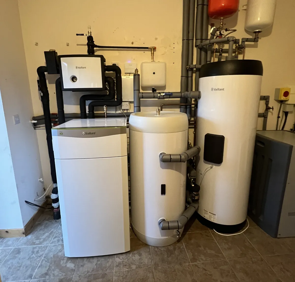 Vaillant flexoTHERM ground source heat pump with insulated pipework and cylinders, installed by Vector Heat