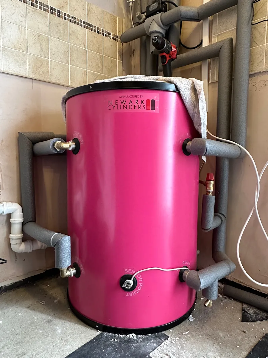 Floor-standing Heat Geek Mini Store with insulated pipework during installation