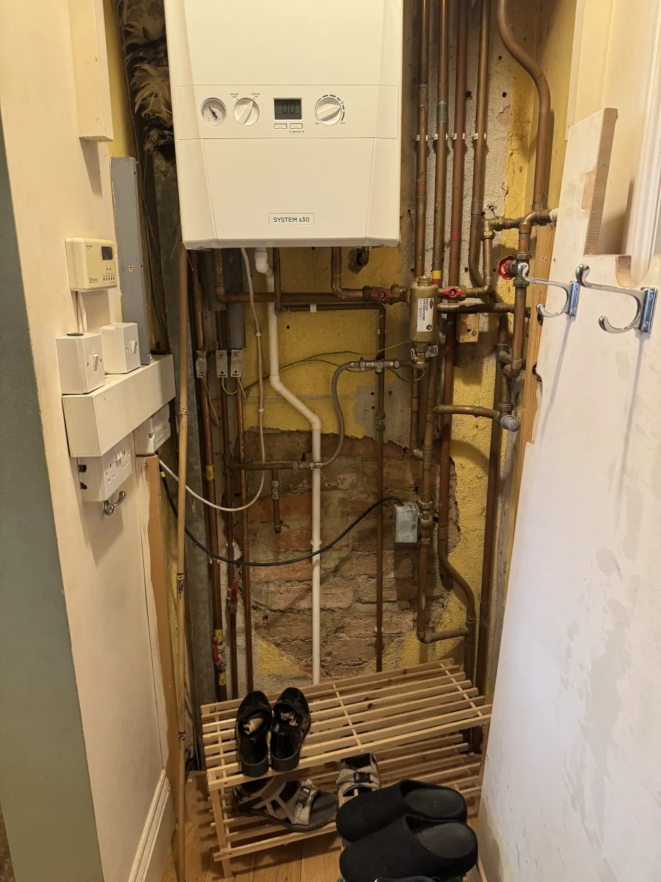 Ideal System S30 boiler installed in an airing cupboard